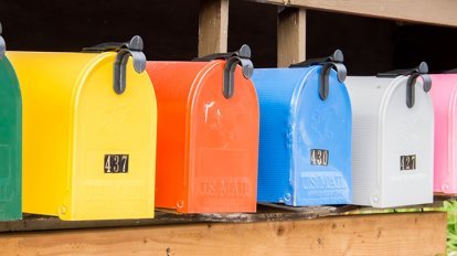 A row of colorful mailboxes